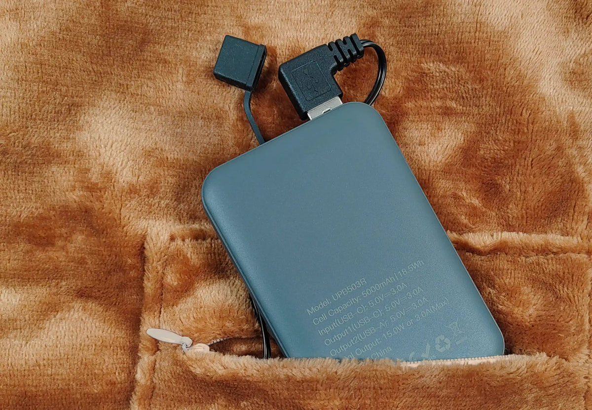 NOOMA - Poncho chauffant nomade